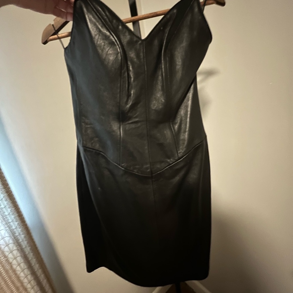 Vintage lesther strapless dress. customized to fit a modern size 4 women’s.